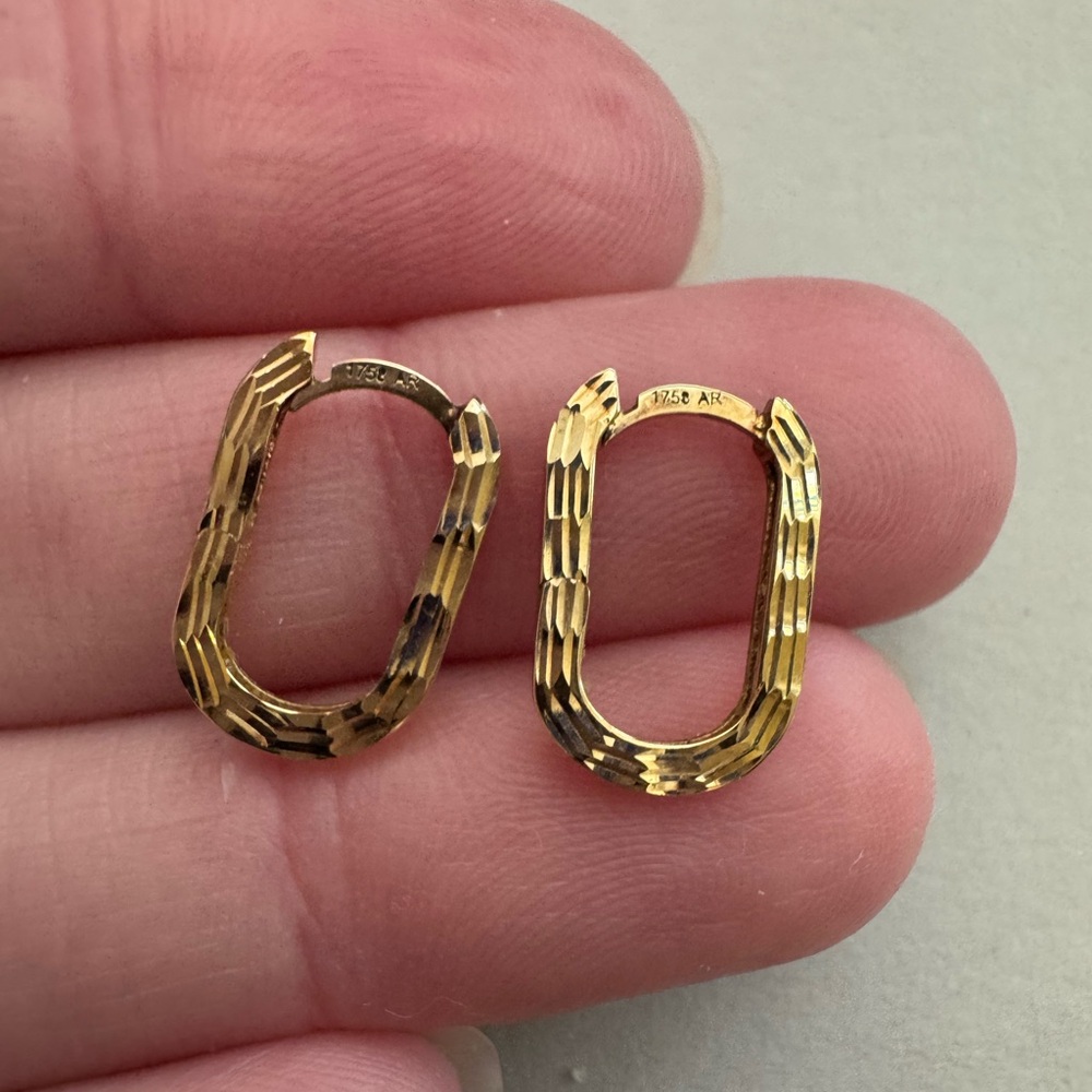 Solid 14k gold Huggies hoop earrings oval shaped textured